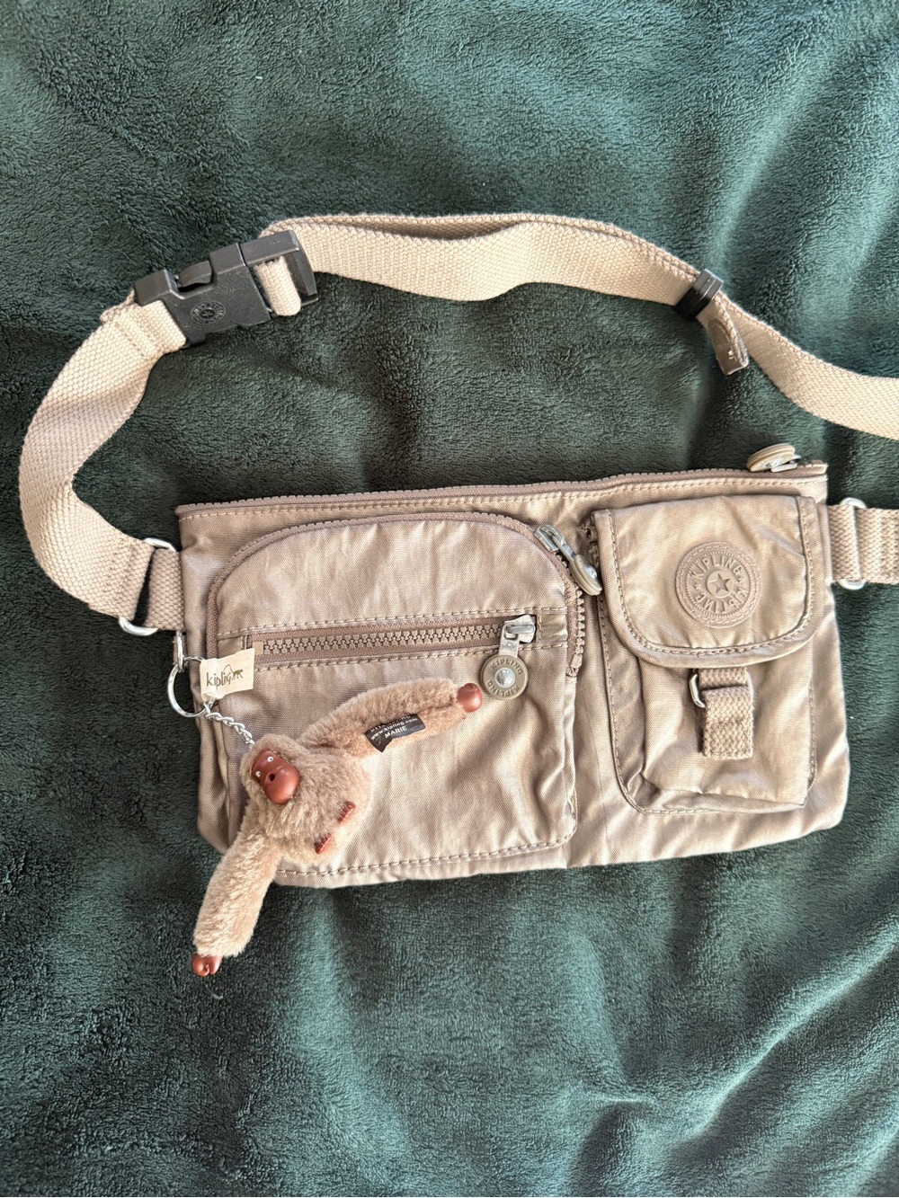 Kipling silver metalic waist Bag with Monkey Keychain